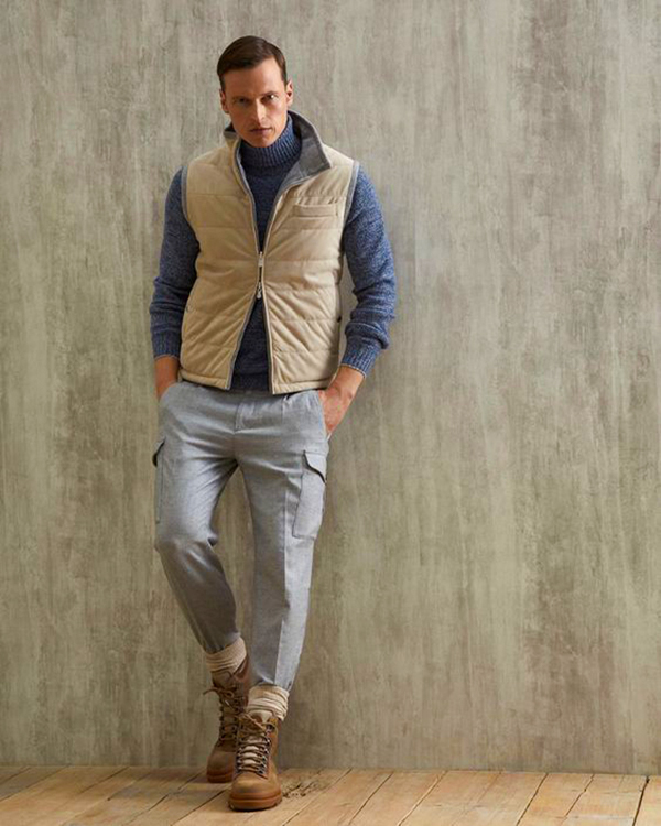 Beige quilted gilet, navy wool turtleneck, gray cargo pants, brown suede work boots outfit
