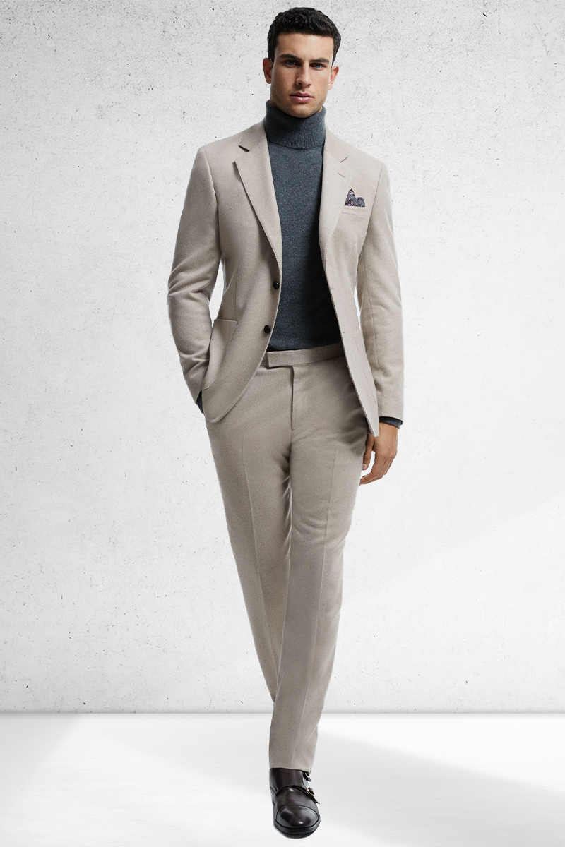Beige suit, blue turtleneck, and dark brown monk strap shoes outfit