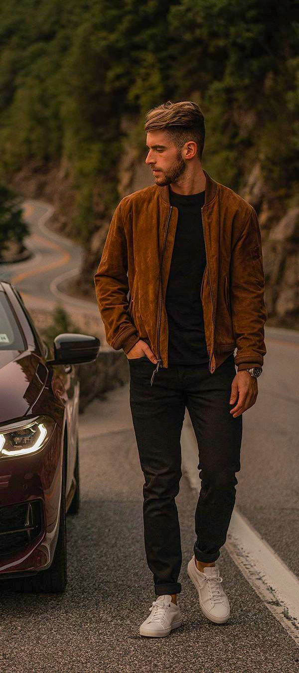 Bomber jacket, crew neck t-shirt, and black jeans outfit