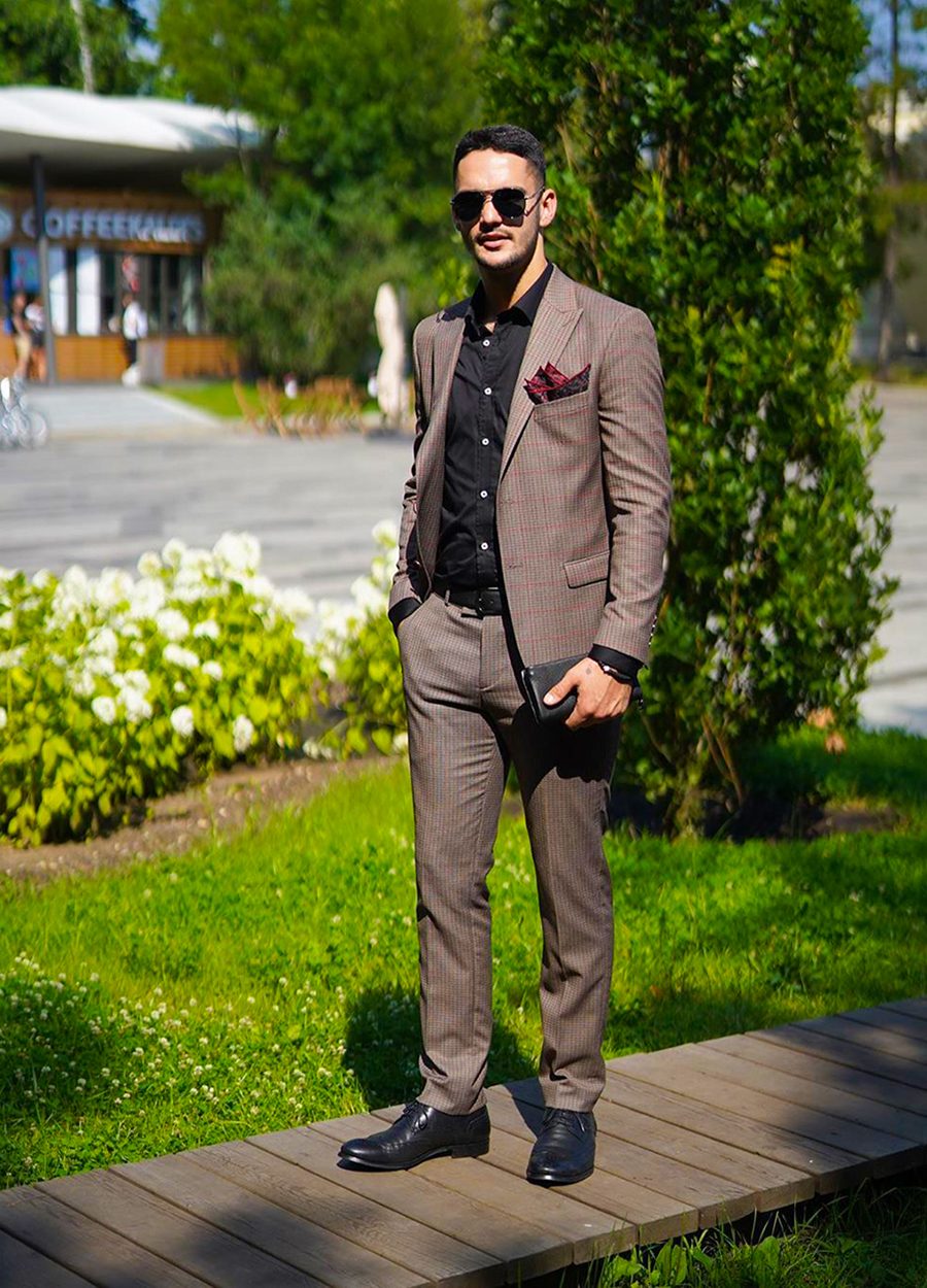 Brown suit, black shirt, and brogues outfit