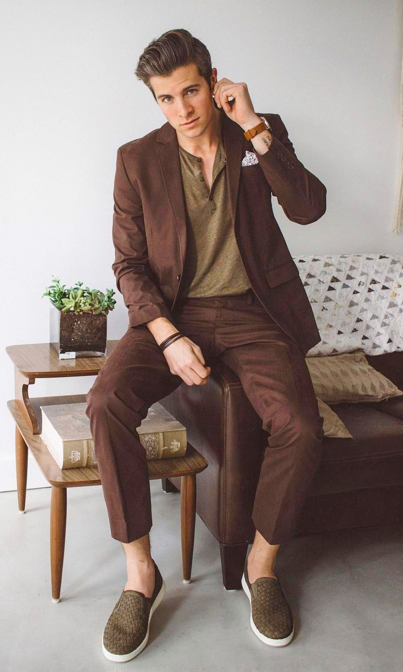 Brown suit, olive polo, and brown slip-on sneakers outfit