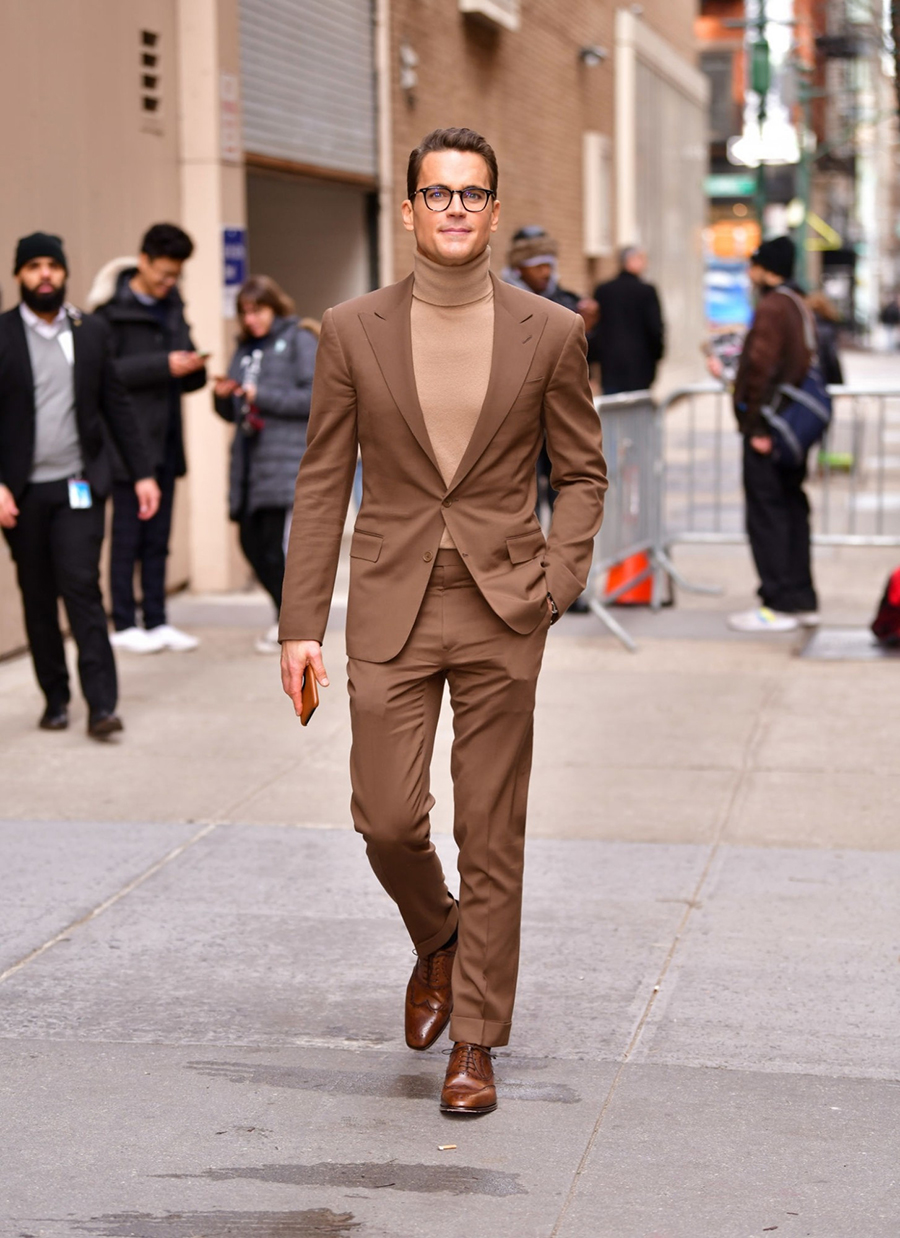 Brown suit, tan turtleneck, and brown oxfords outfit