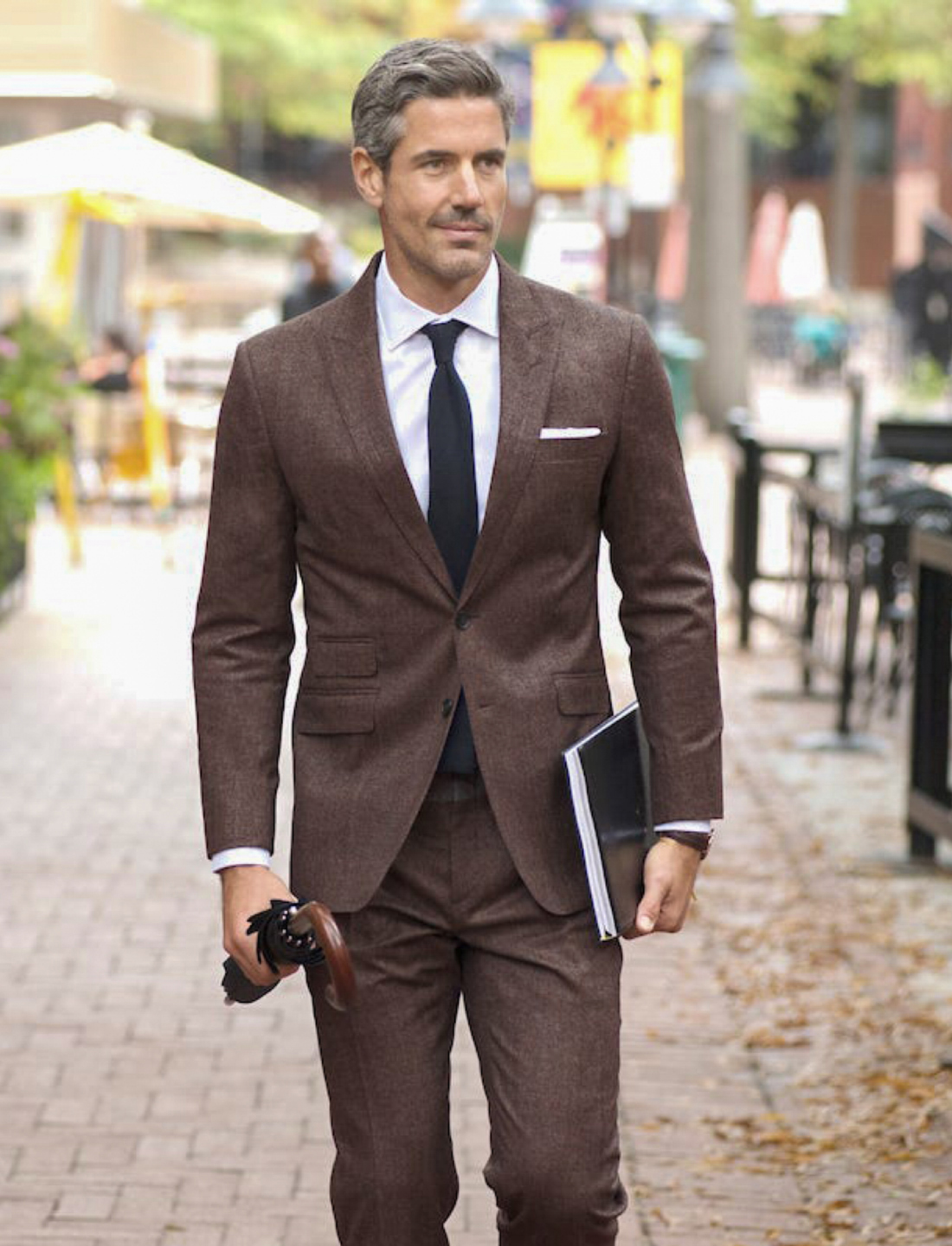 Brown suit, white shirt, and black tie outfit