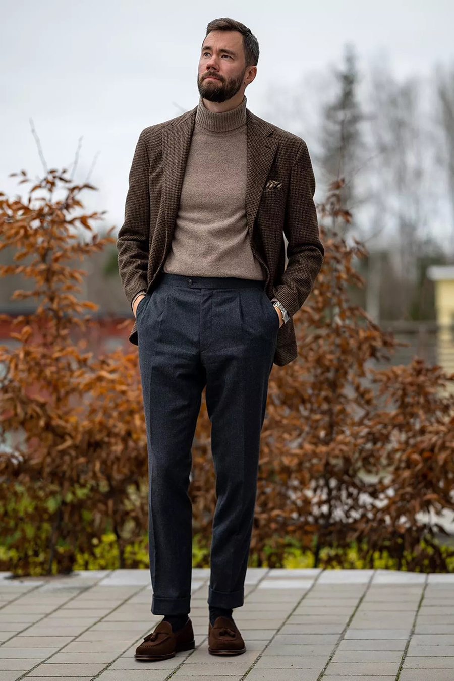 Brown tweed sport coat, brown turtleneck, navy dress pants, and brown suede loafers outfit