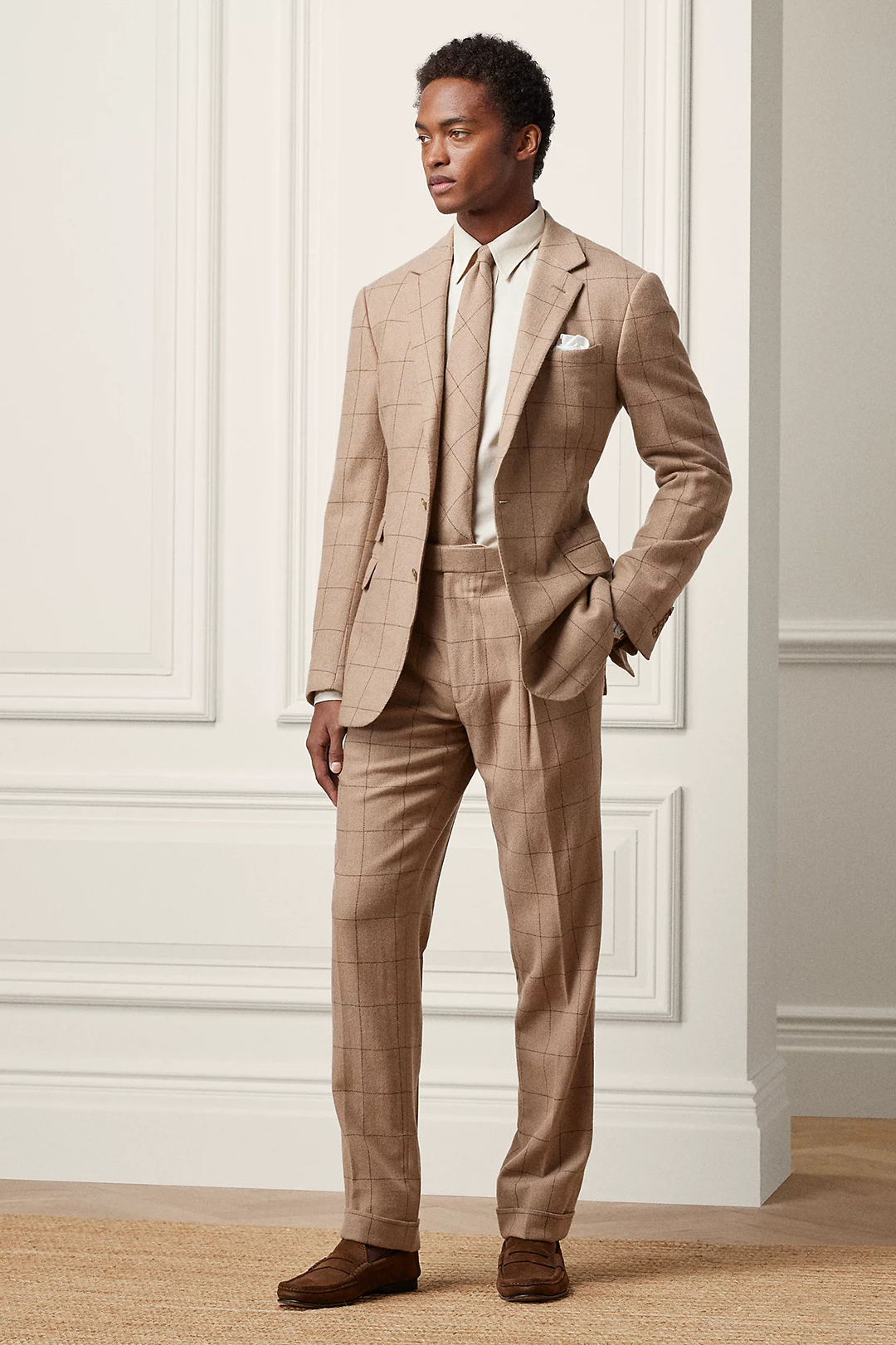 Brown windowpane suit, white dress shirt, brown tie, and dark brown loafers outfit