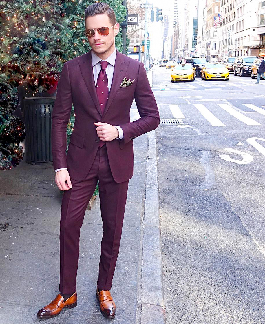 Burgundy suit, pink shirt, maroon tie, and brown penny loafers outfit