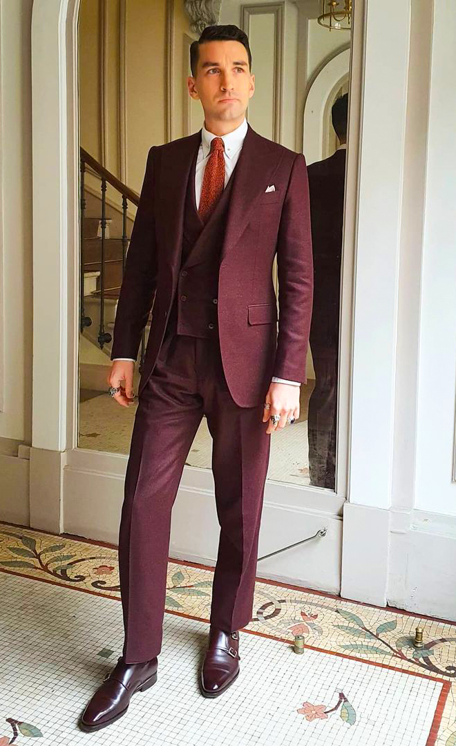 burgundy three-piece suit, dress shirt, and double monks outfit