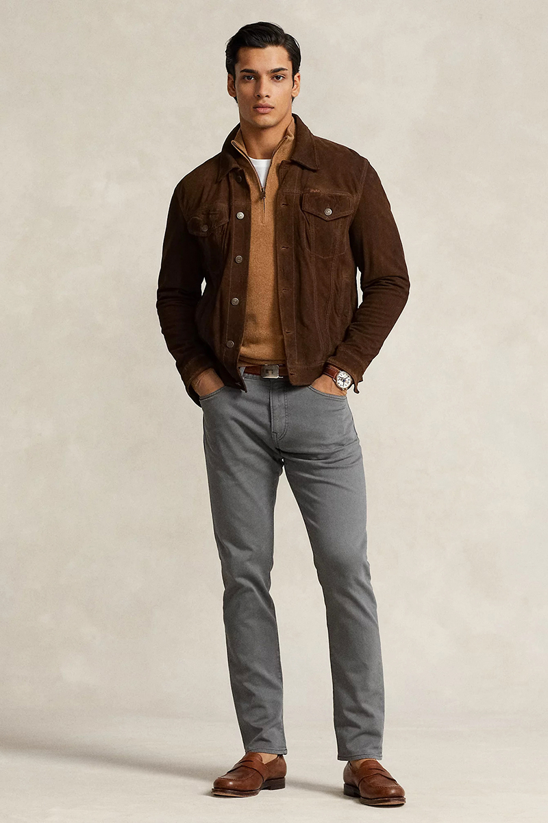 Dark brown corduroy shacket, brown zip neck sweater, grey chinos, and brown loafers outfit