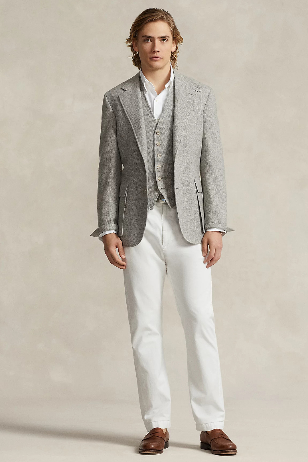 Gray blazer, gray waistcoat, white dress shirt, white pants, AND brown loafers outfit