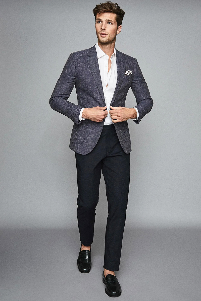 Gray textured blazer, white dress shirt, black trousers, and black loafers outfit