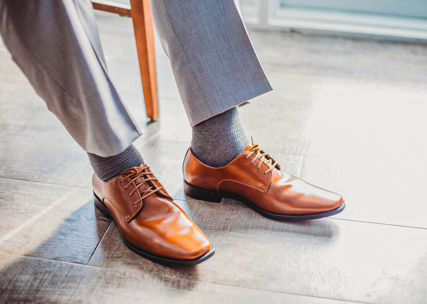 Medium brown derby shoes with medium gray dress pants