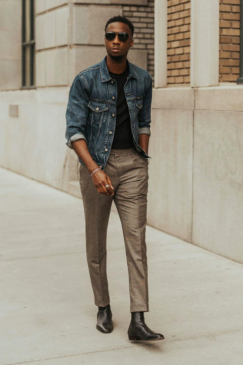 Navy denim jacket, black crew neck t-shirt, brown chinos, and black leather Chelsea boots outfit
