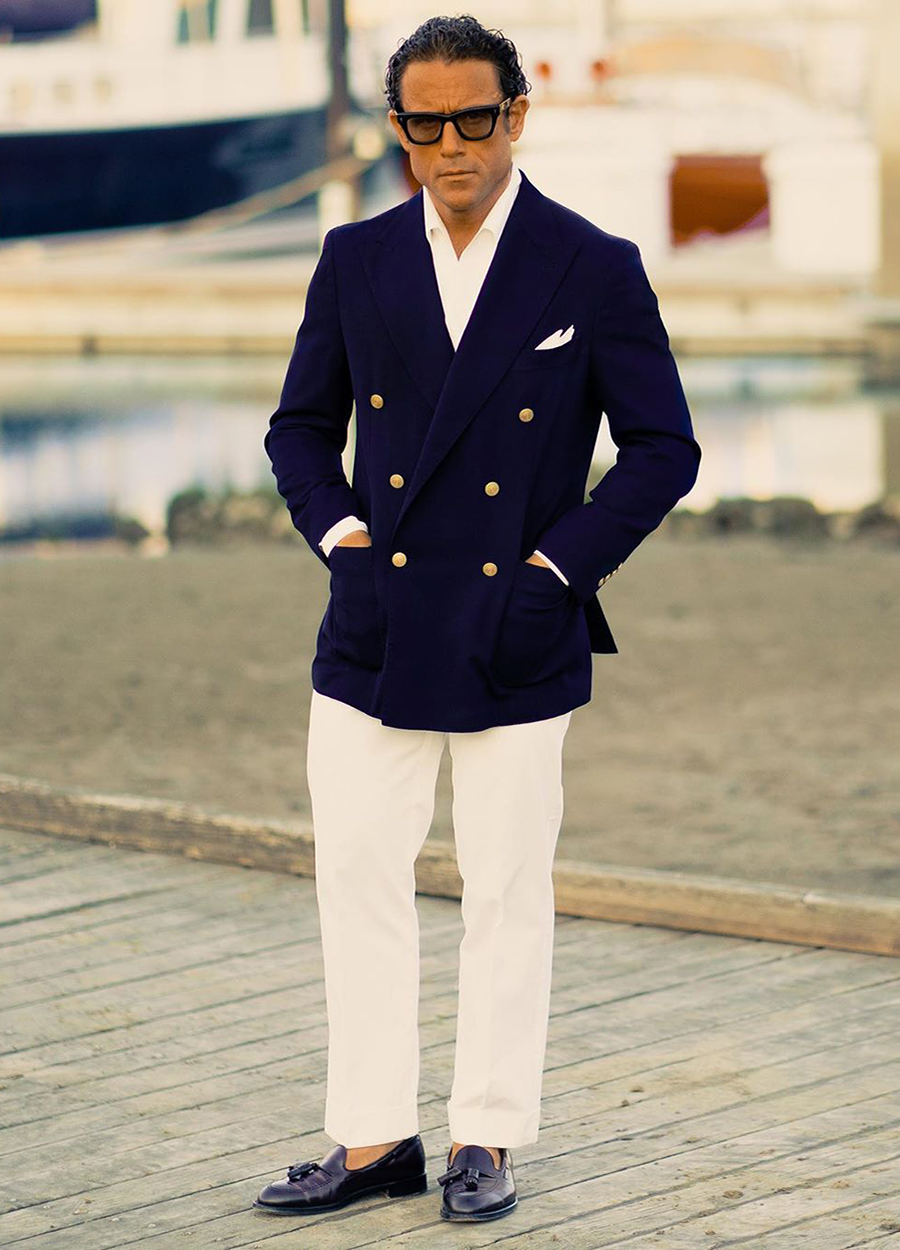 Navy double-breasted blazer, white shirt, white dress pants, and brown leather loafers outfit