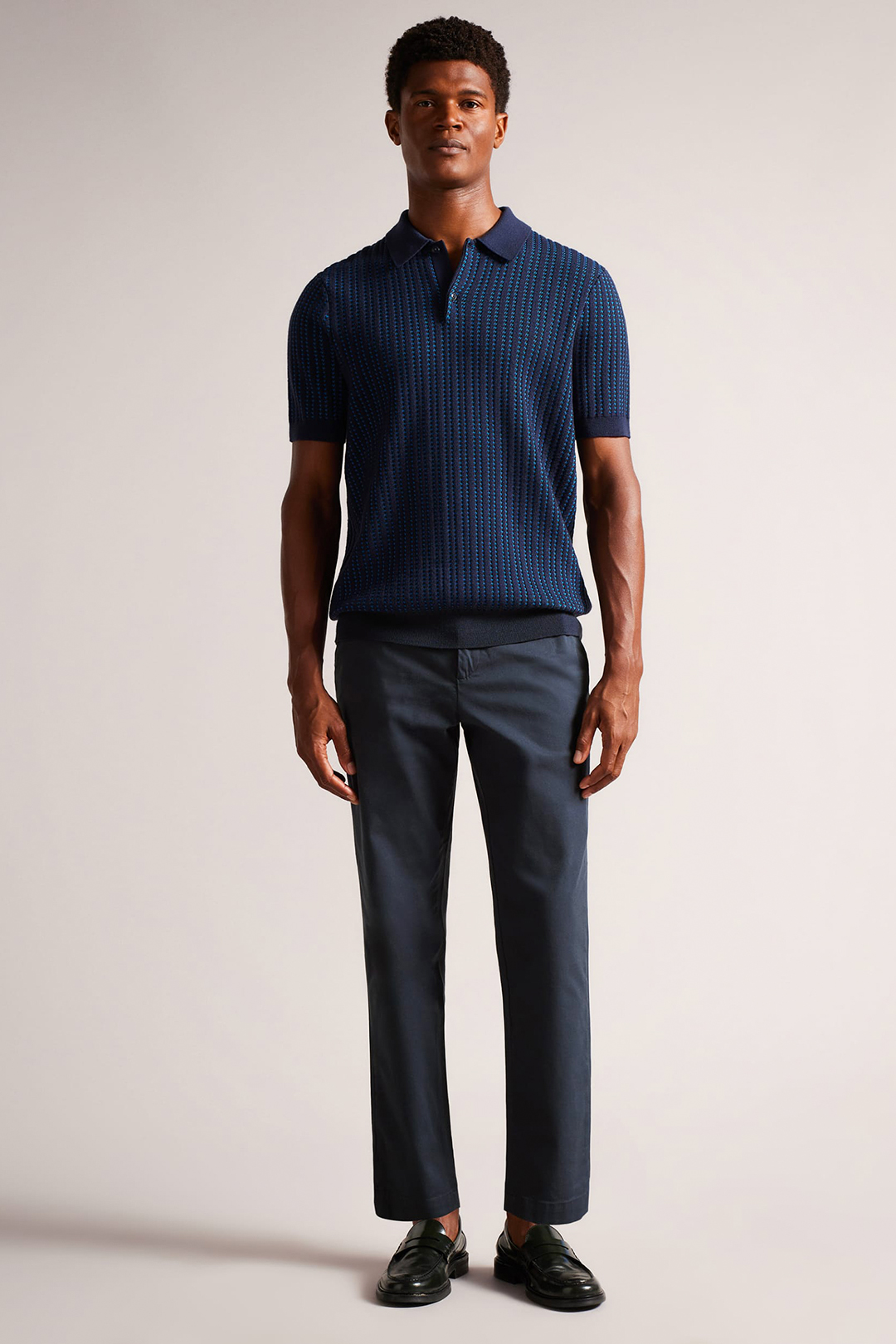 Navy polo t-shirt, navy chinos, and black loafers outfit