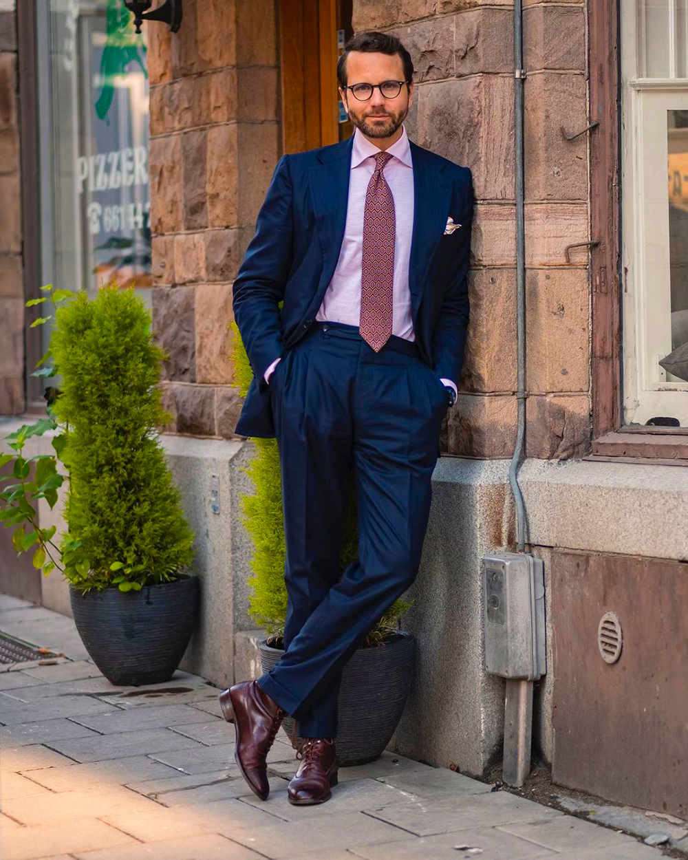 Navy suit with a pink dress shirt and shoes outfit