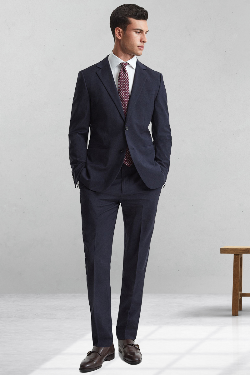 Navy suit, white dress shirt, burgundy dotted tie, and dark brown monk strap shoes outfit