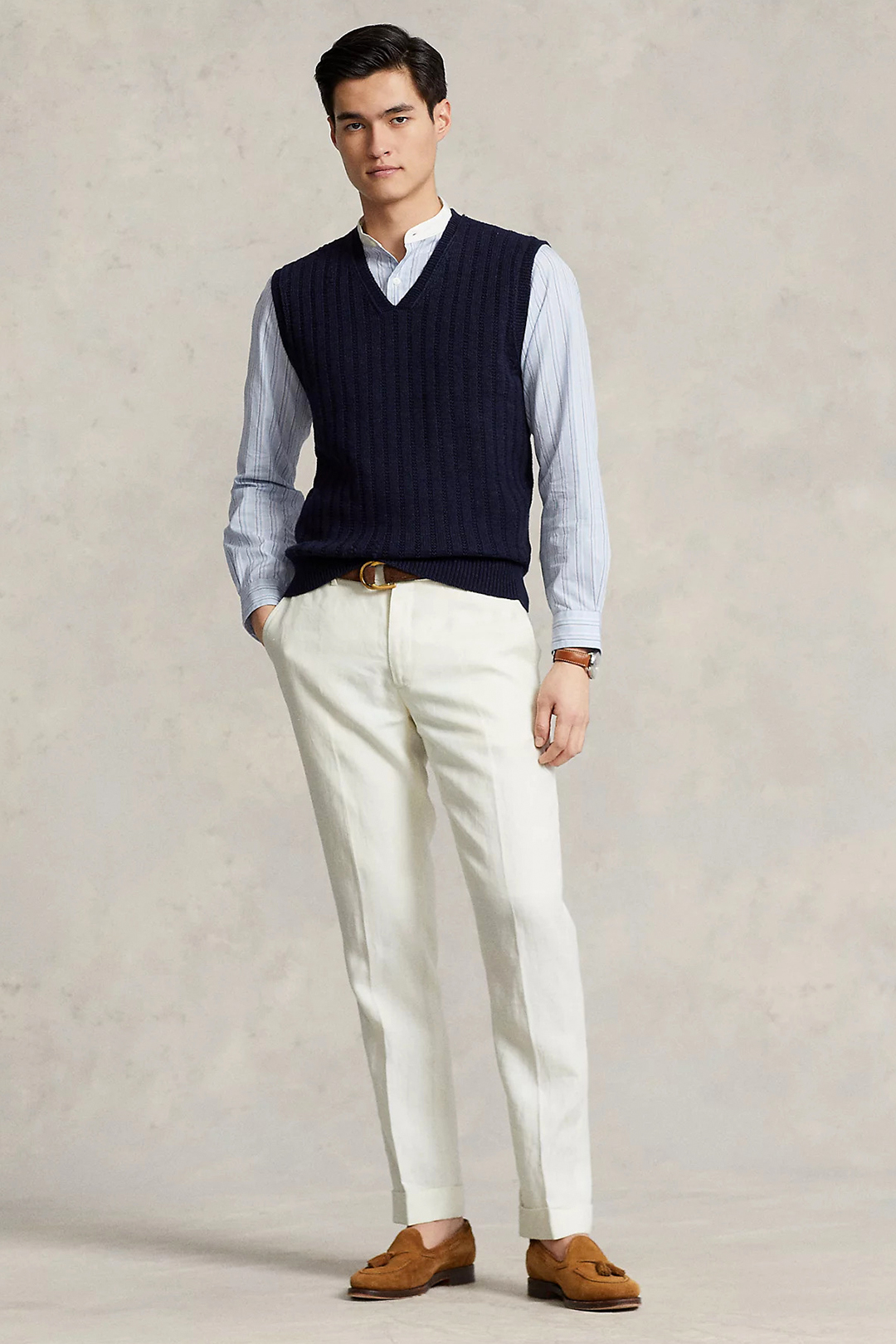 Navy sweater vest, blue and white shirt, off white dress pants and brown loafers outfit