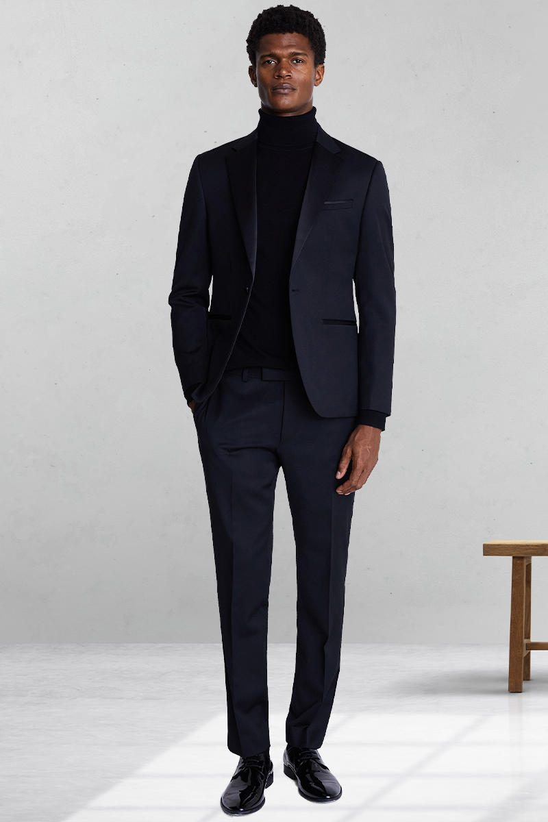 Navy tuxedo, navy turtleneck, and black polished derby shoes outfit