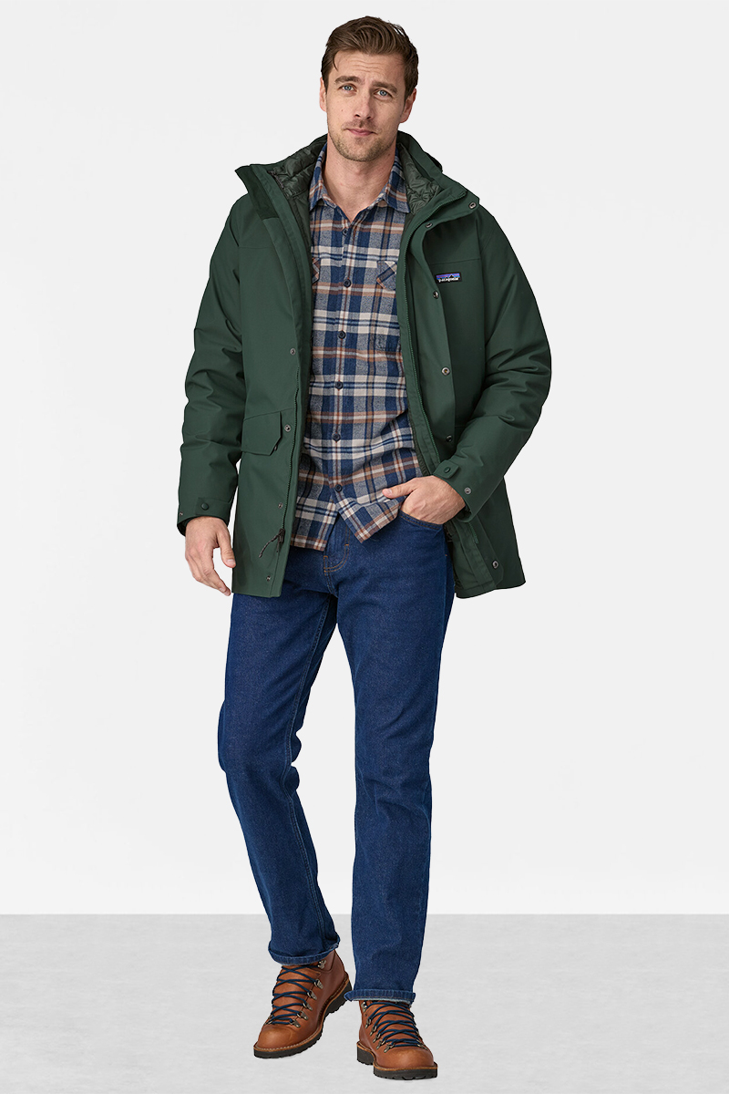 Olive parka jacket, plaid shirt, blue jeans, and brown boots outfit