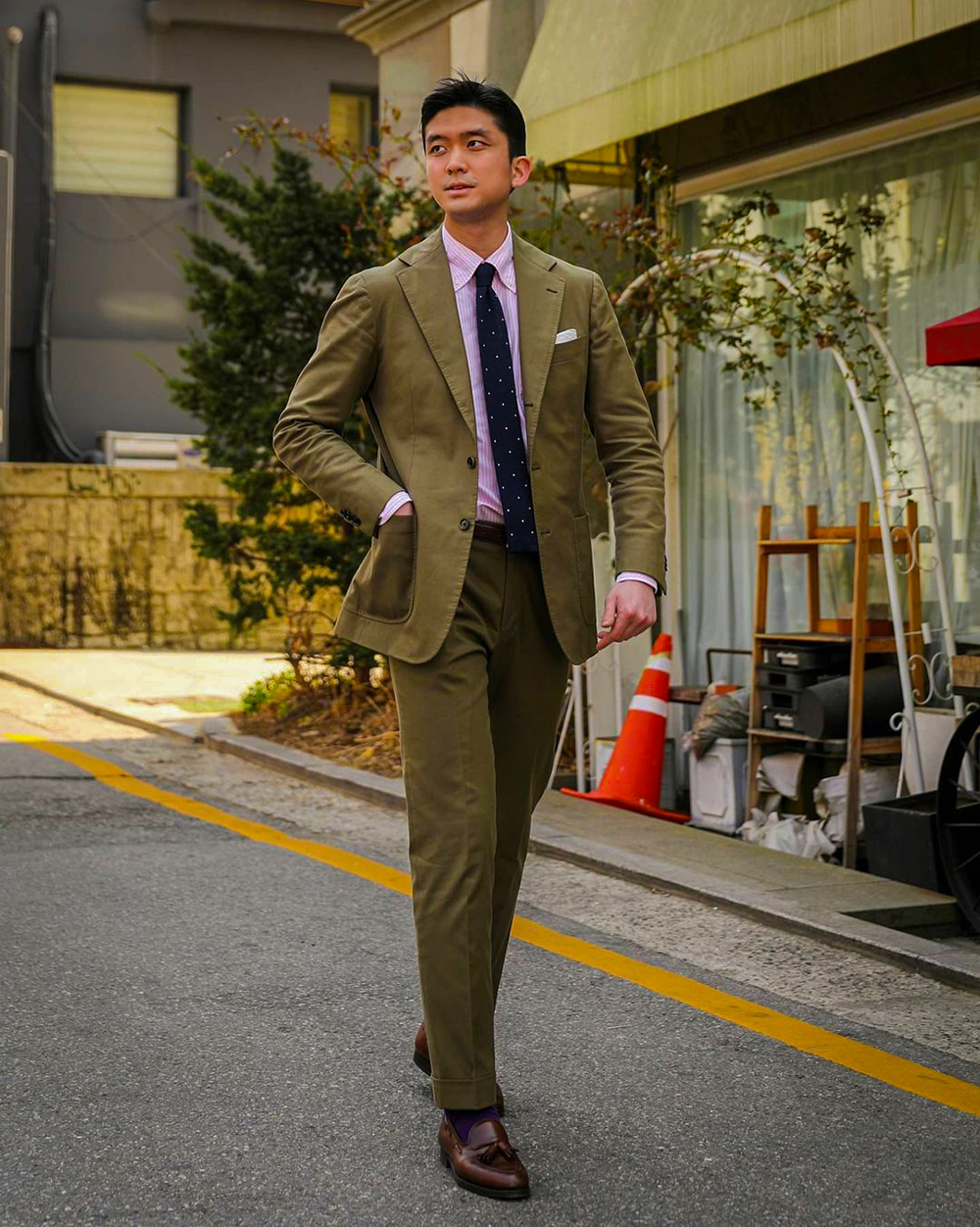 Olive suit, pink dress shirt, tassel loafers outfit