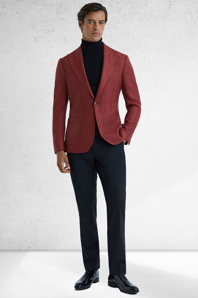 Red blazer, black turtleneck, navy dress pants, and black wholecut oxford shoes outfit