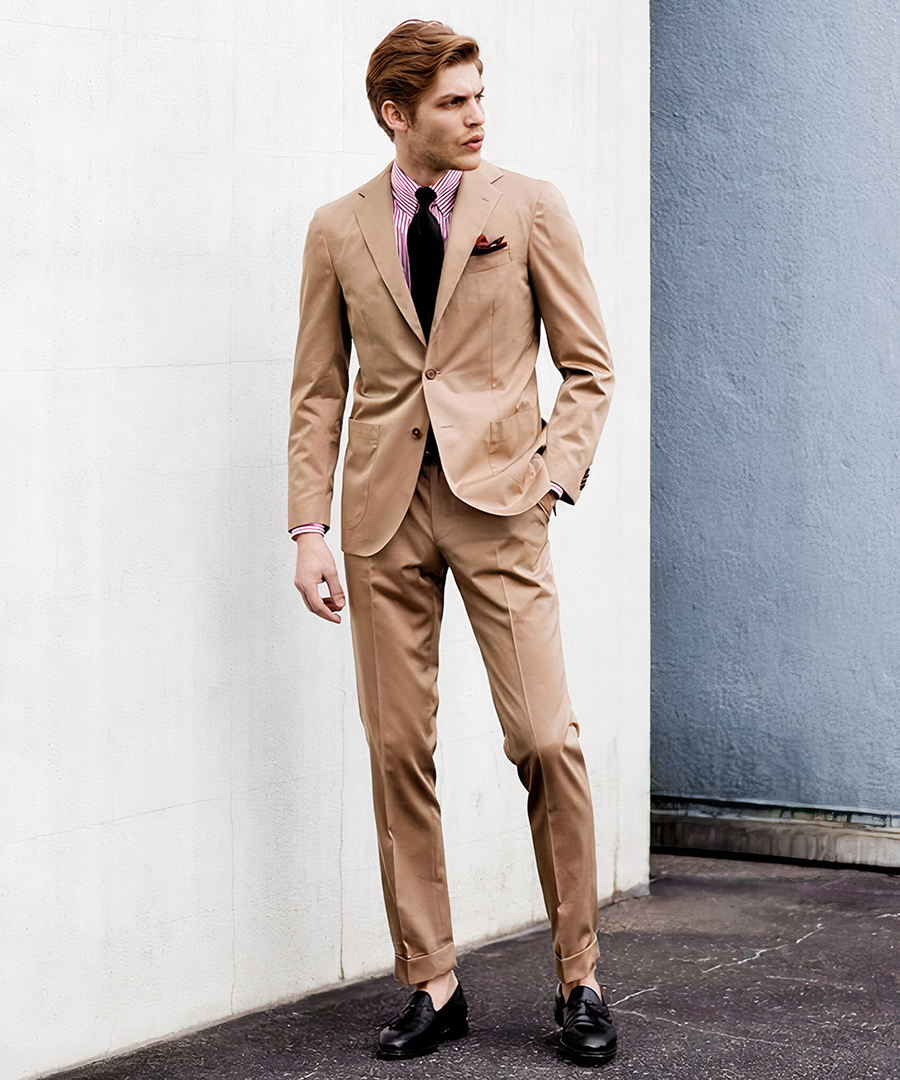 Tan suit, light pink striped shirt, and black loafers outfit