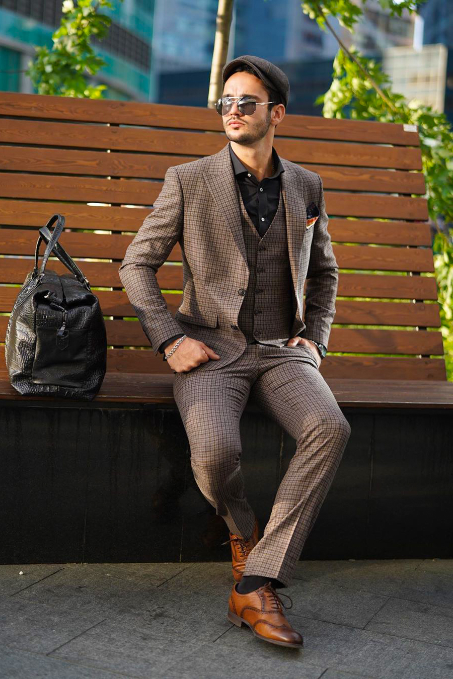 Three-piece brown suit, dress shirt, and brogues outfit