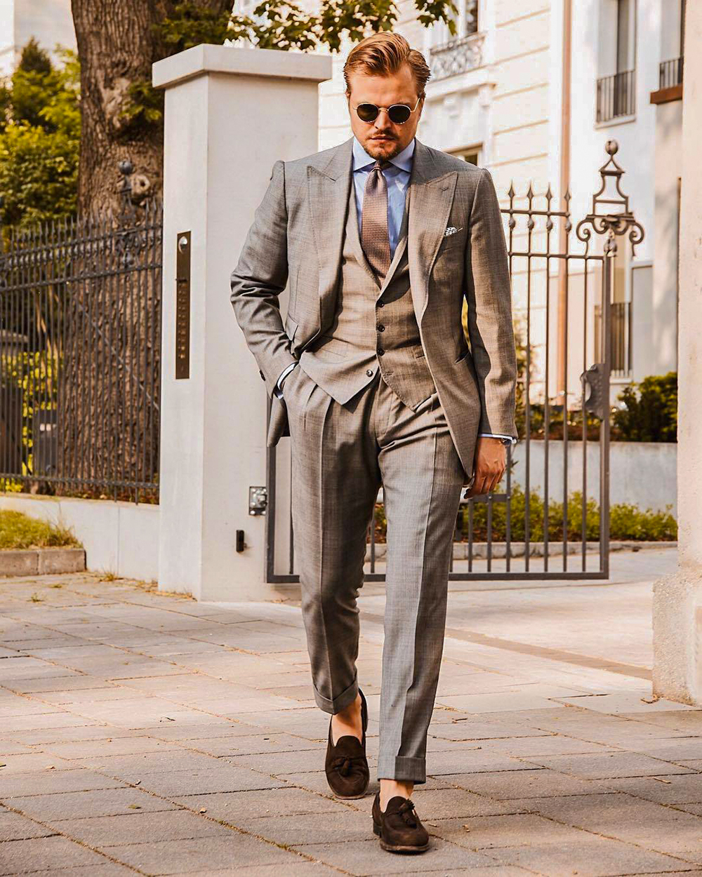 Three piece brown suit with dress shirt and  tassel loafers outfit