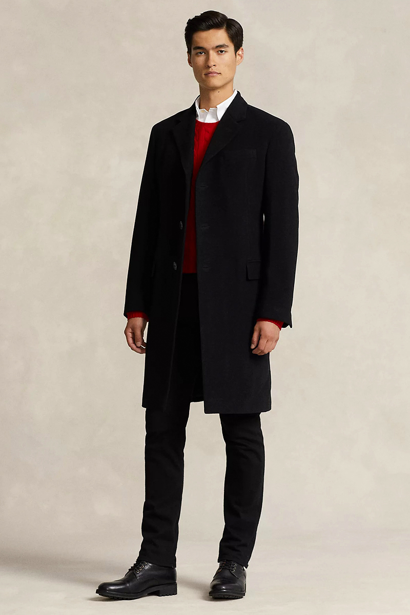 Wear a black overcoat, red sweater over white dress shirt, black chinos, and black derby shoes