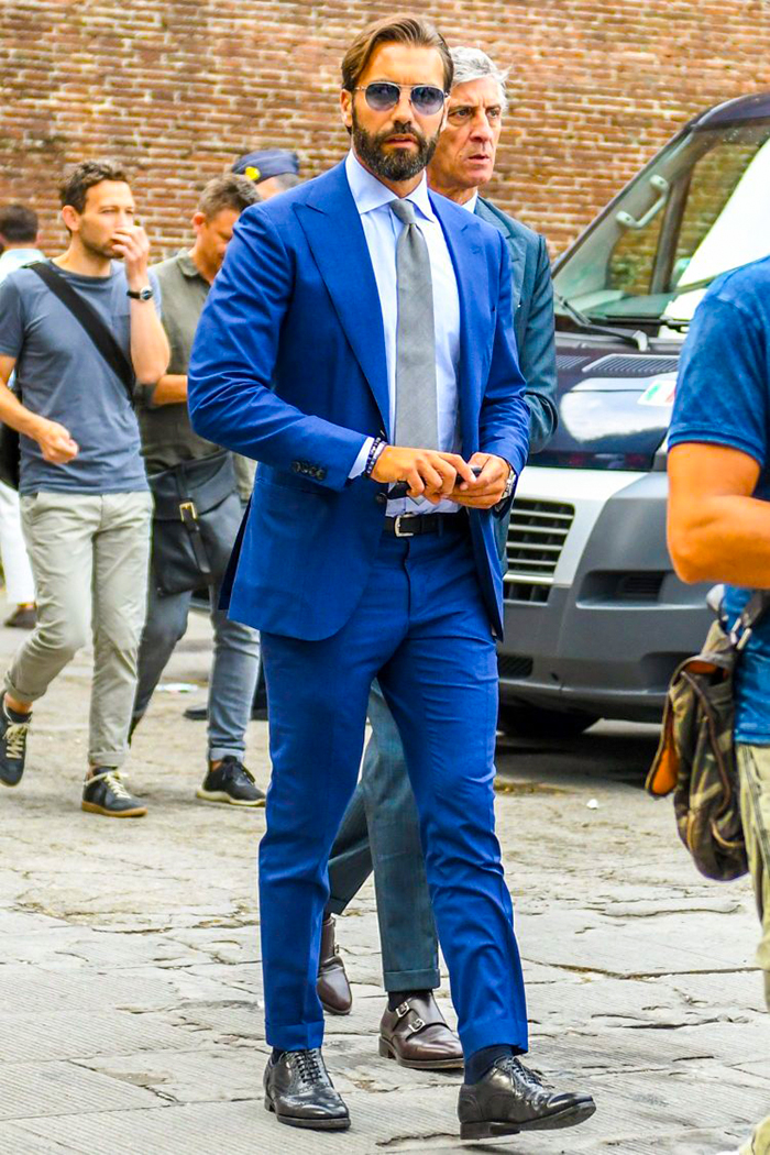 Wear a blue suit with gray tie and brown shoes