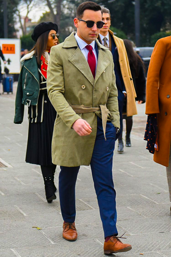 Wear blue suit, olive trenchcoat, and brown suede derbies