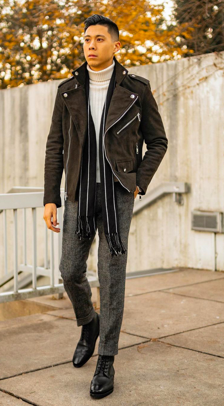 Wear white turtle neck, biker jacket, chinos, and brogue boots