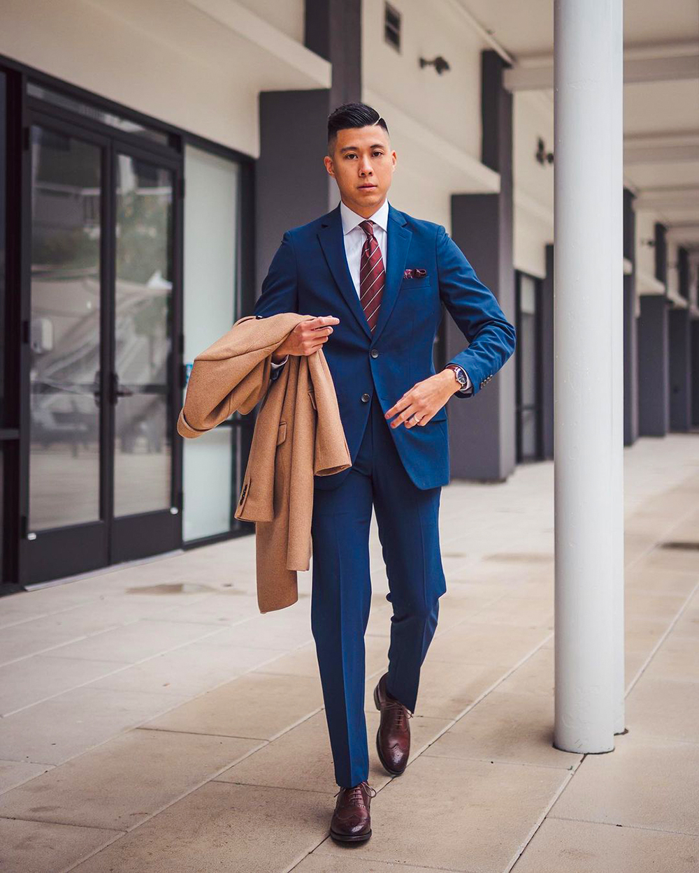 Camel overcoat, blue suit, red tie, dark brown brogues outfit