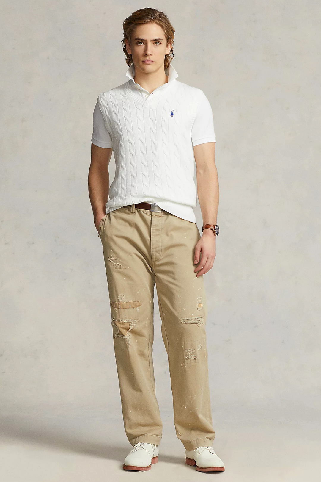 White sweater vest, white t-shirt, khaki chinos and beige derby shoes outfit